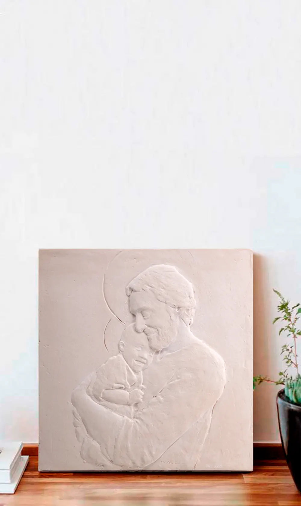 Relieve de San José con el Niño Jesús